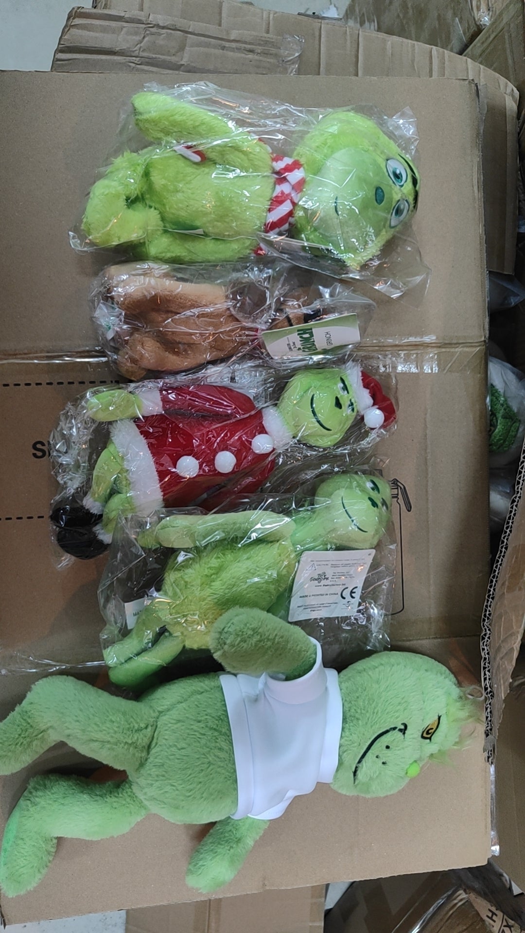 300pcs Grinch dolls with sub thisrts & 100pcs sub Tshirts & 1000pcs sub MDF cash holder & 250pcs apron & 300pcs ironed patch