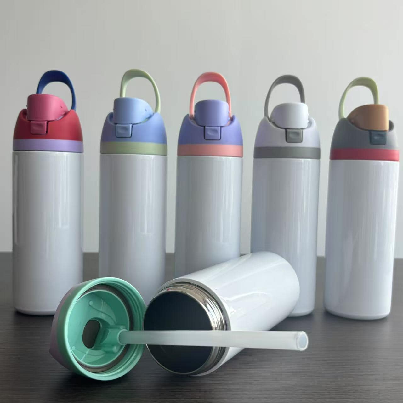 25pcs 24oz Sublimation Flip Straw Lid Insulated Stainless Steel Sports Owala Style War Bottle & 25pcs 16oz sublimation Christmas satinless cans & 30pcs lids